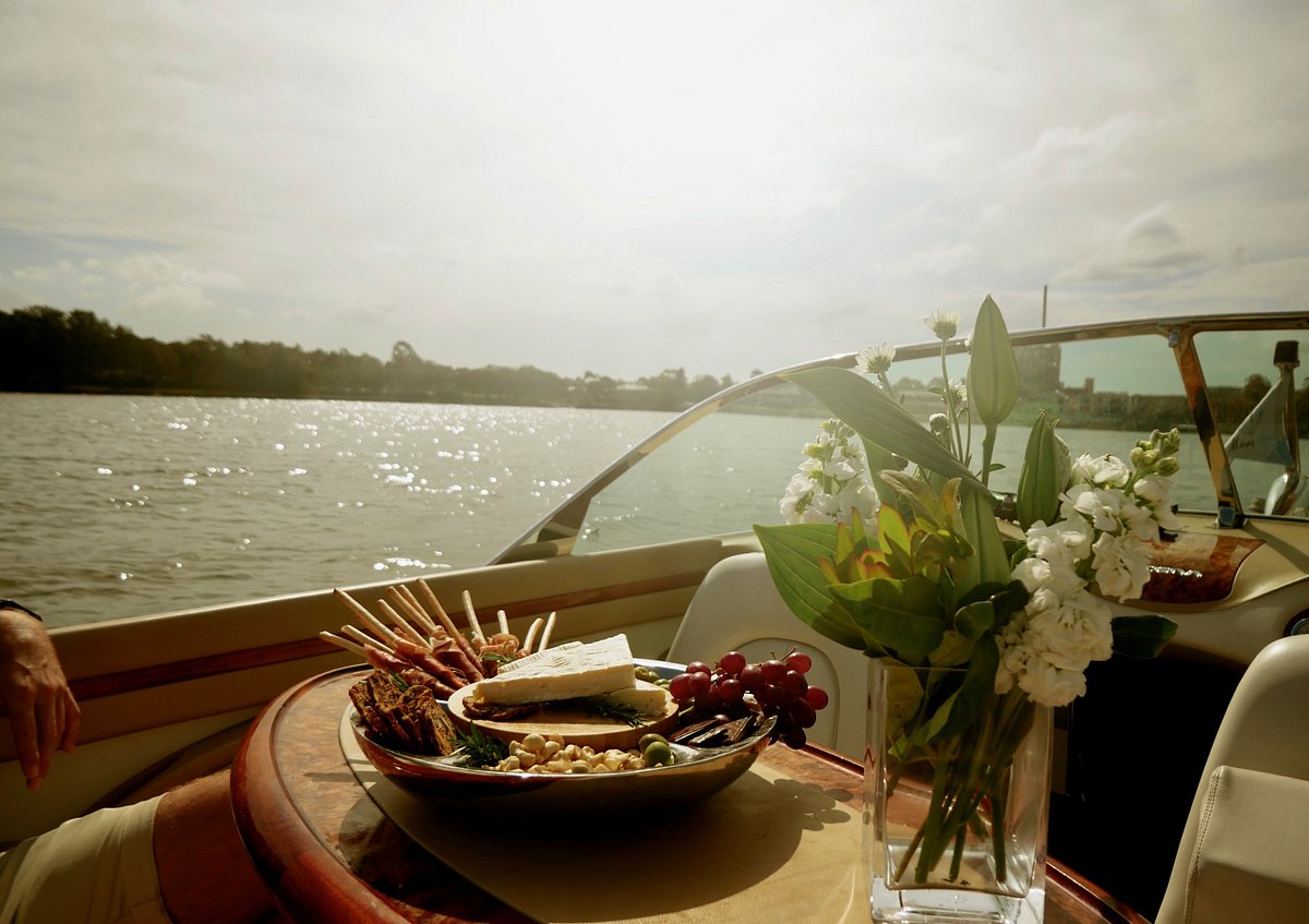 Champagne and grazing platter on board Mon Cheri during a river cruise
